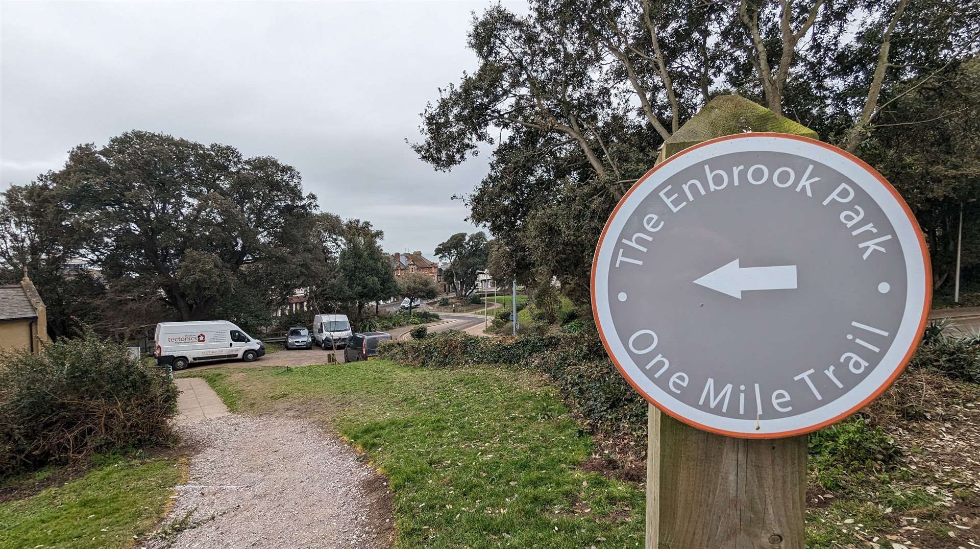 Trails lead down from the hillside to the village and sea