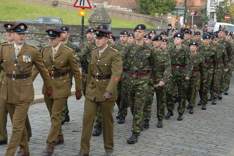 A Remembrance Sunday parade in Rochester High Street