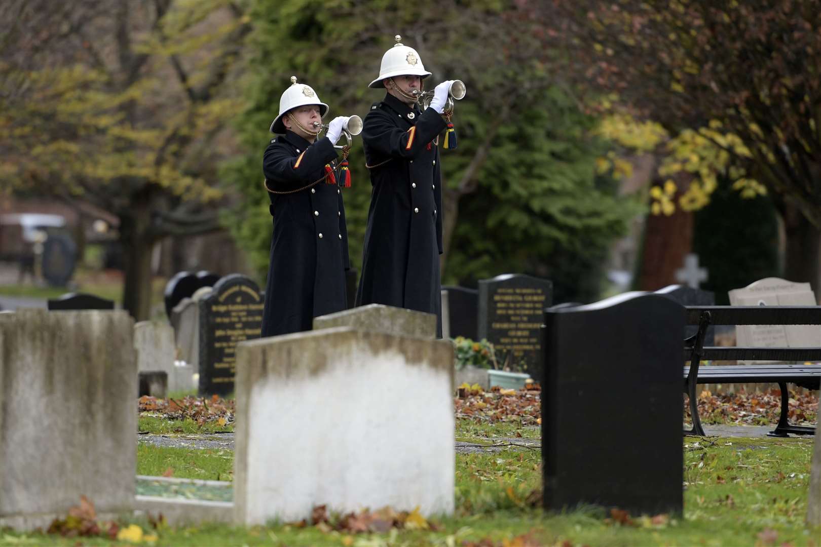 The last post is played at the 70th anniversary of Dock Road tragedy when 24 marine cadets lost their lives in a bus crash recognised in service at Woodlands Cemetery in Gillingham. Picture: Barry Goodwin