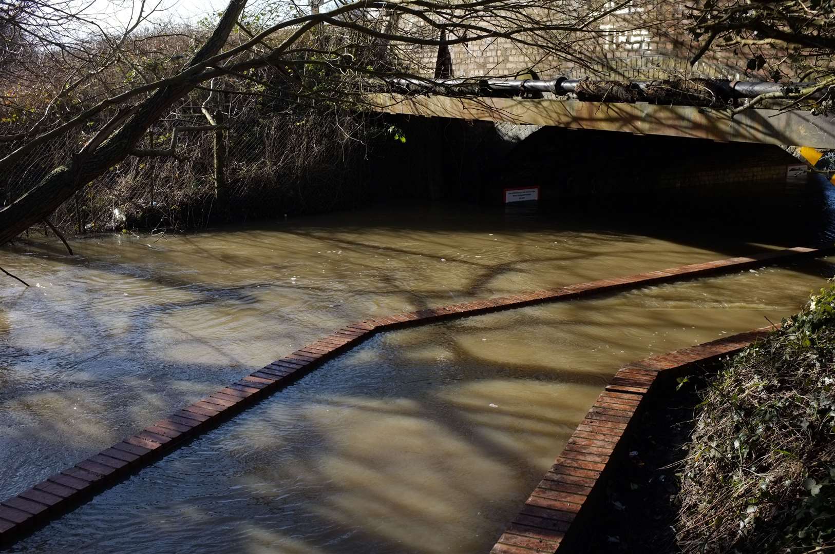 The water level can reach the height of the wall, as this picture from 2014 shows. Picture: Joe Hitchmough