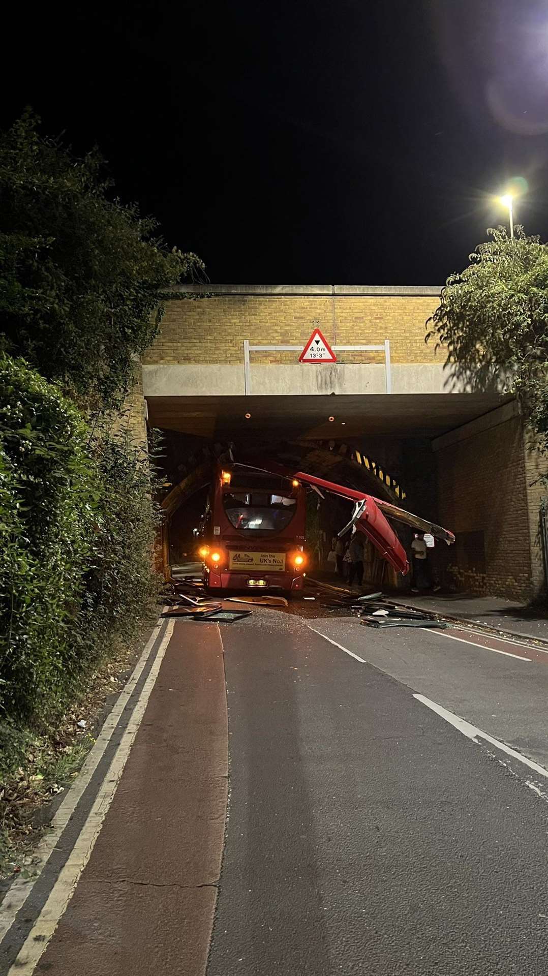 The road was closed for four hours while the bus was recovered.. Picture: @chrispiela/Twitter