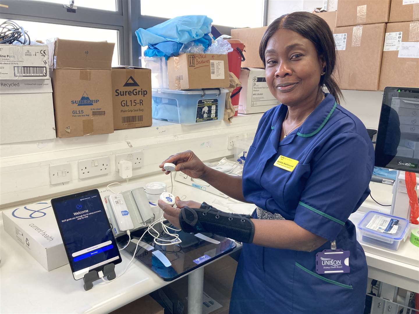 Medway Maritime Hospital's Smart team leader Jackie Hammond, who is behind the virtual wards project, demonstrates some of the equipment