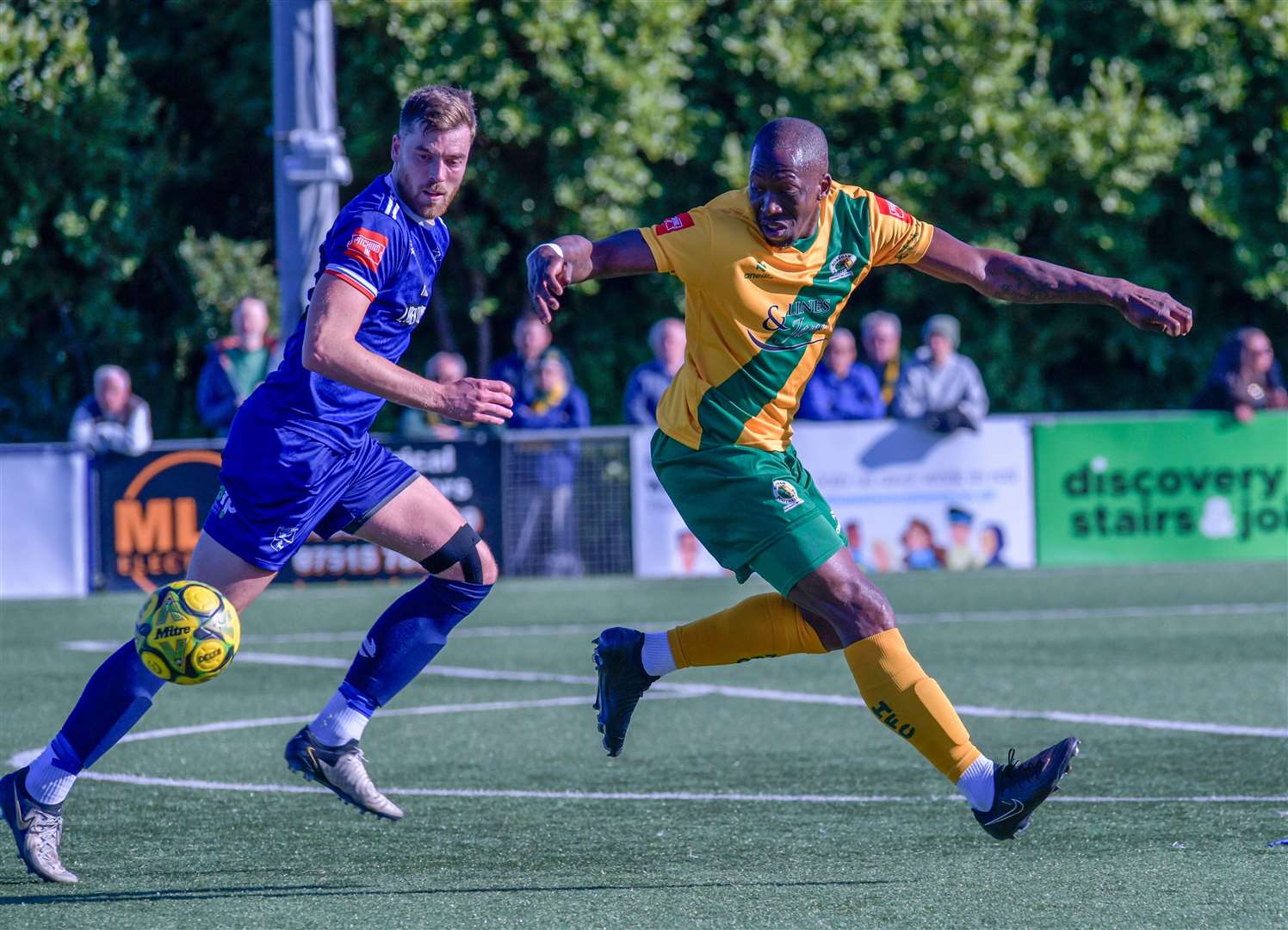 Margate defender Lewis Knight keeps tabs on Horsham striker Chris Dickson. Picture: Stuart Watson