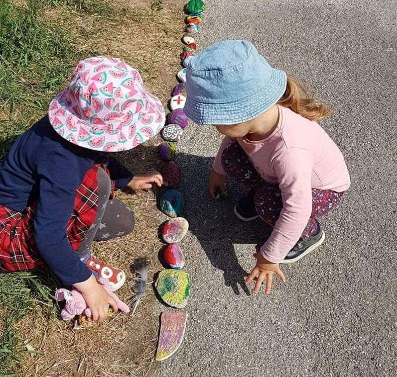 During the lockdown people of all ages added stones decorated with colourful pictures, and messages of solidarity and support. Picture: Aimee Skinner