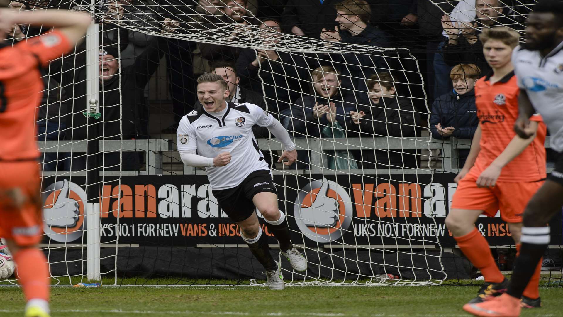 Scorer Andy Pugh and Duane Ofori-Acheampong wheel away celebrating Dartford's equaliser to make it 1-1 Picture: Andy Payton