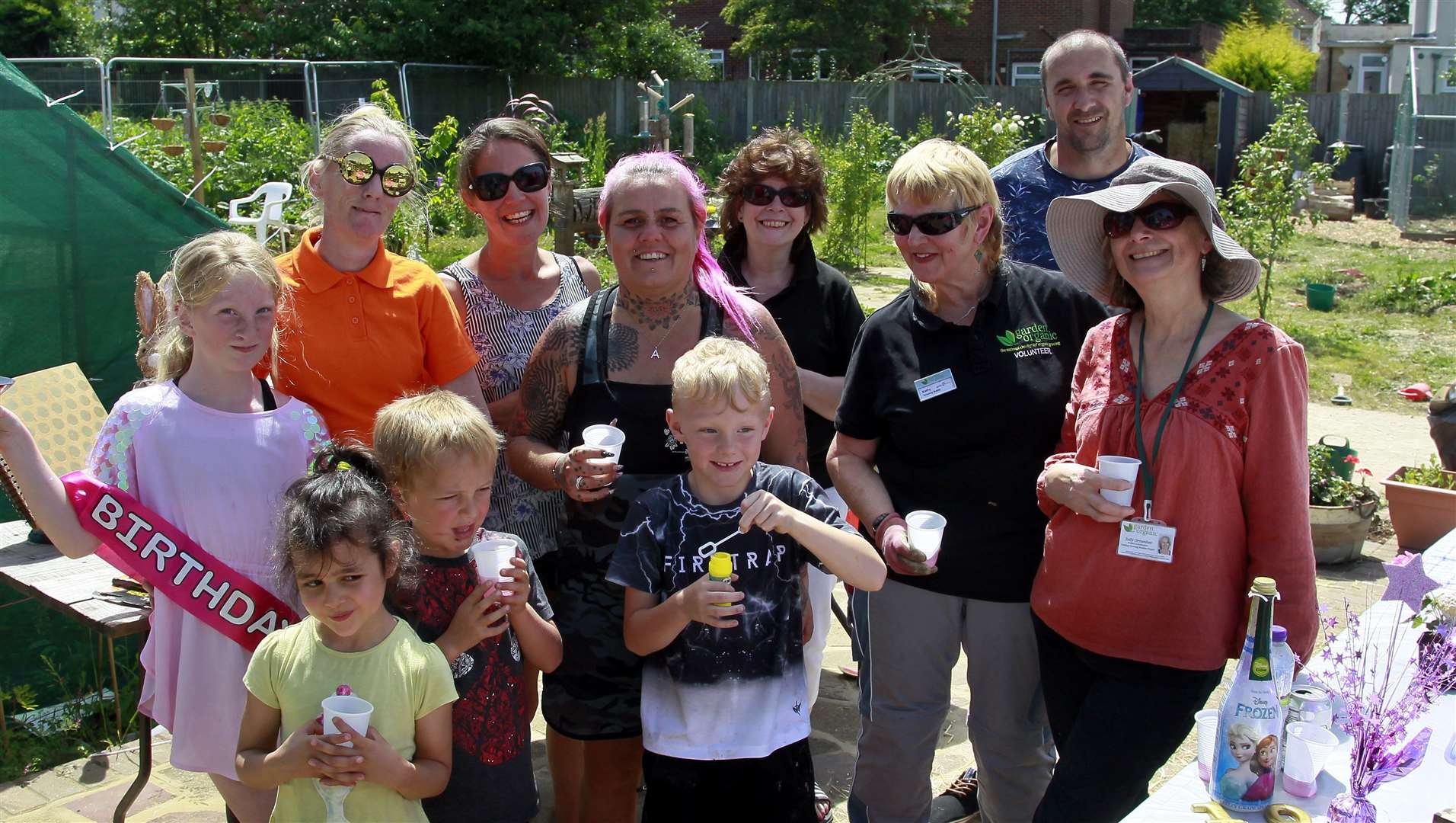 Happier times: The Shepway Chariots hold events such as lunch parties for the community, but the garden is becoming overgrown thanks to the pandemic Picture: Sean Aidan