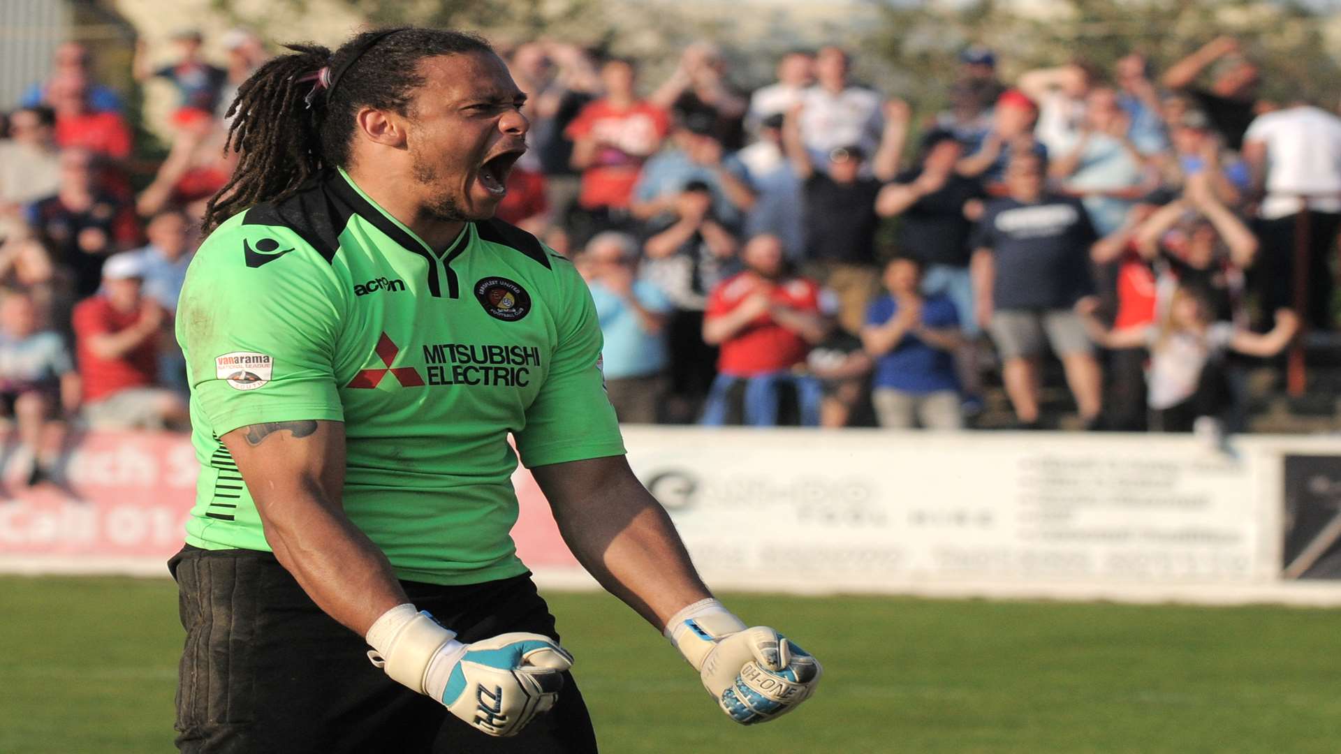 Nathan Ashmore celebrates saving a penalty in the shootout Picture: Ruth Cuerden