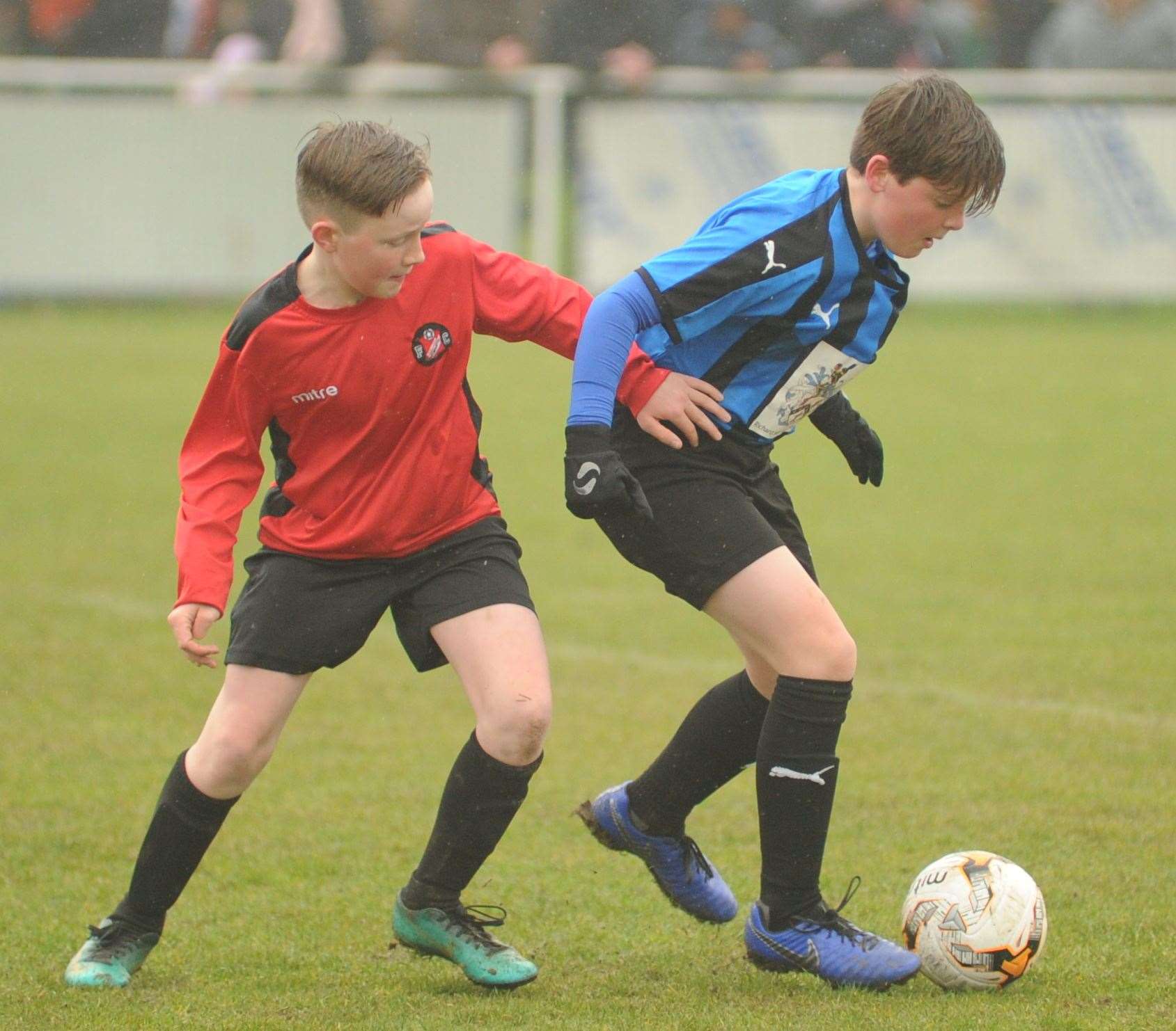 Under-12 John Leeds Trophy finalists Omega 92 Spartans (blue/black) and Rainham Kenilworth battle it out Picture: Steve Crispe