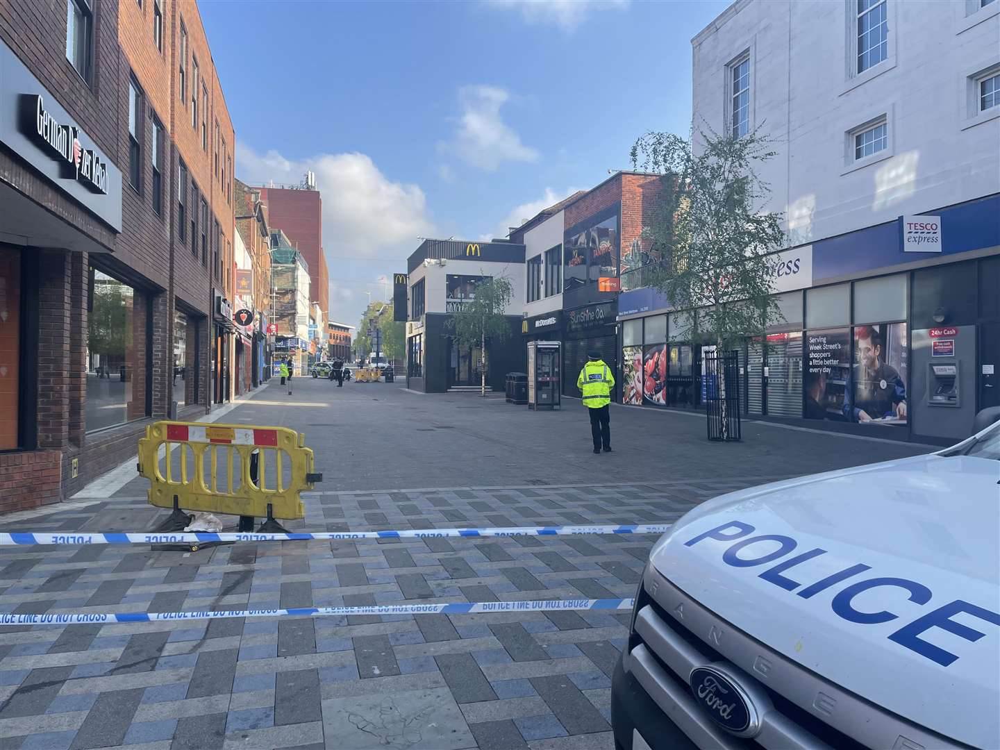 Police in Week Street Maidstone after a stabbing near the KFC restaurant in April