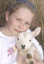 Cara McNicol with her new friend. Picture: GRANT FALVEY