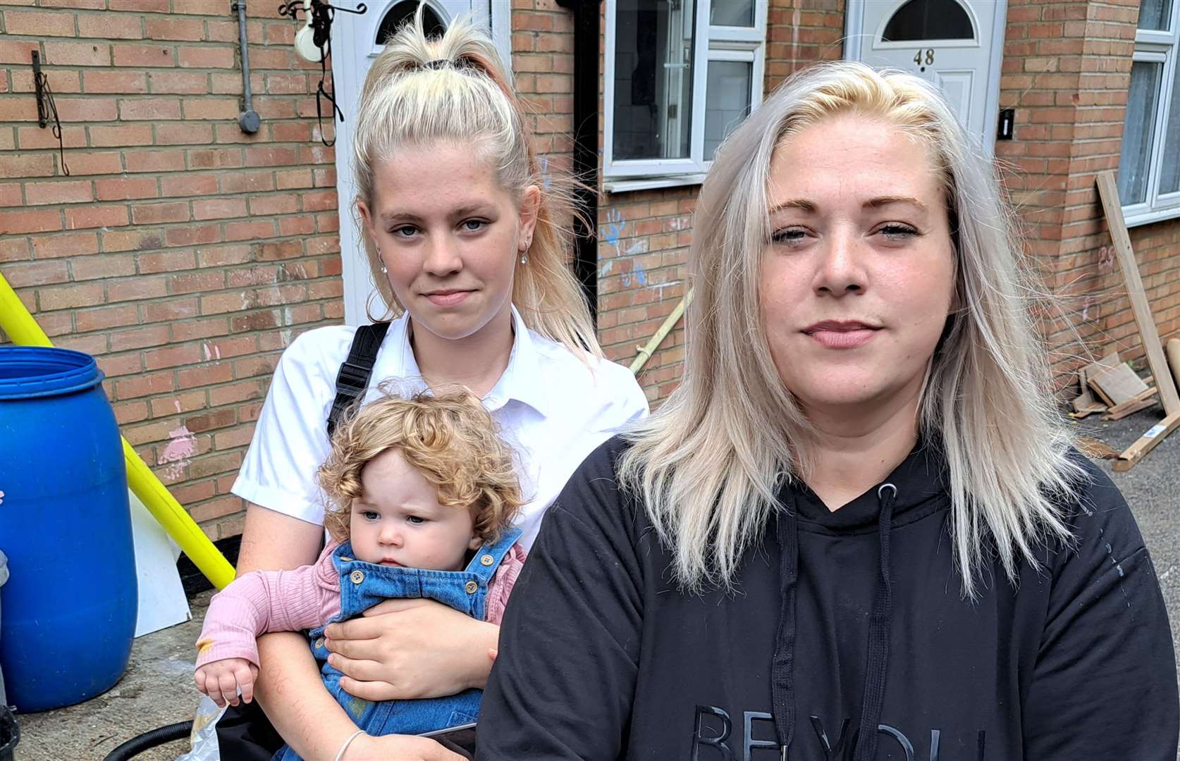 Hayley Atherton with two of her children, Millie, 12, and Lily, 11 months