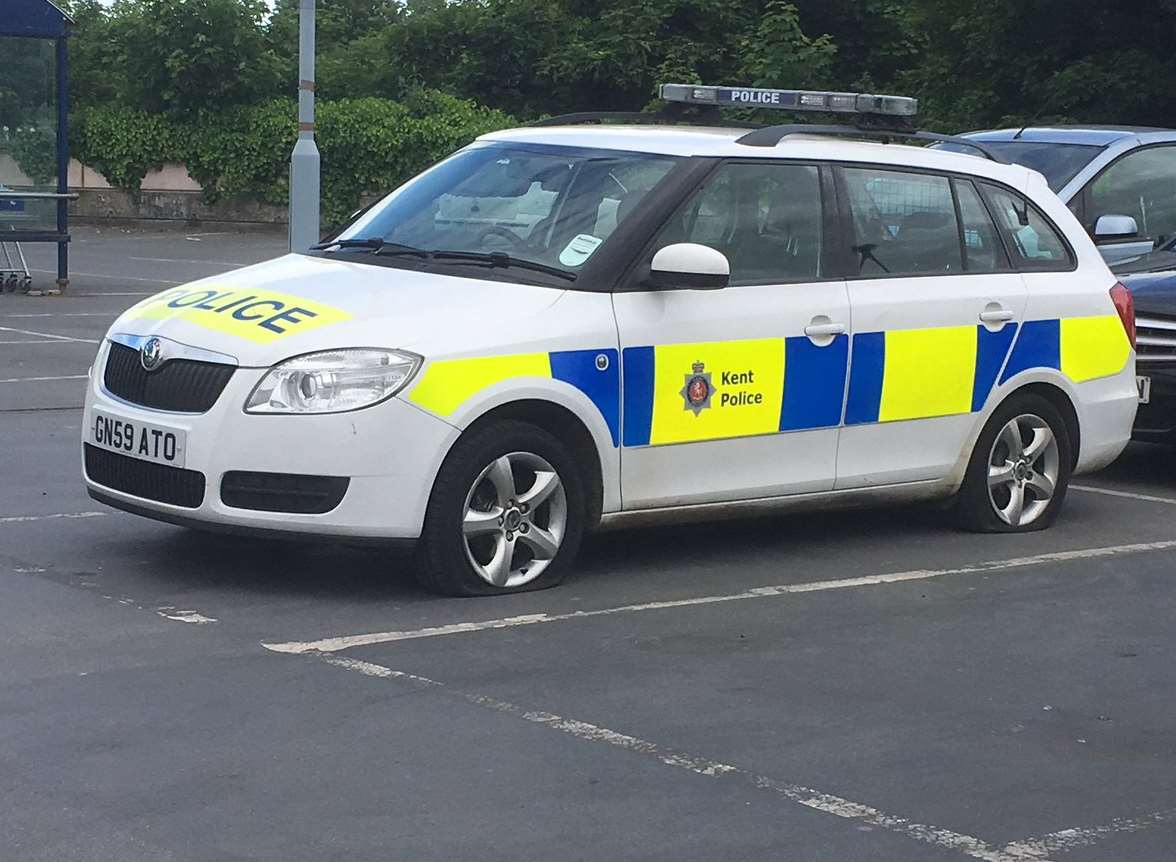 A police car was seen in Maidstone with three flat tyres. Pic: @Nathan_R1971