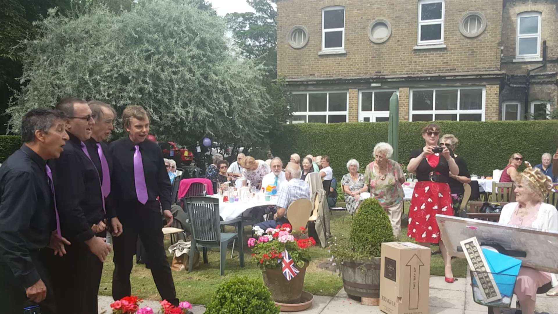 The Notables barber shop quartet serenade Marjorie Beton on her 100th birthday