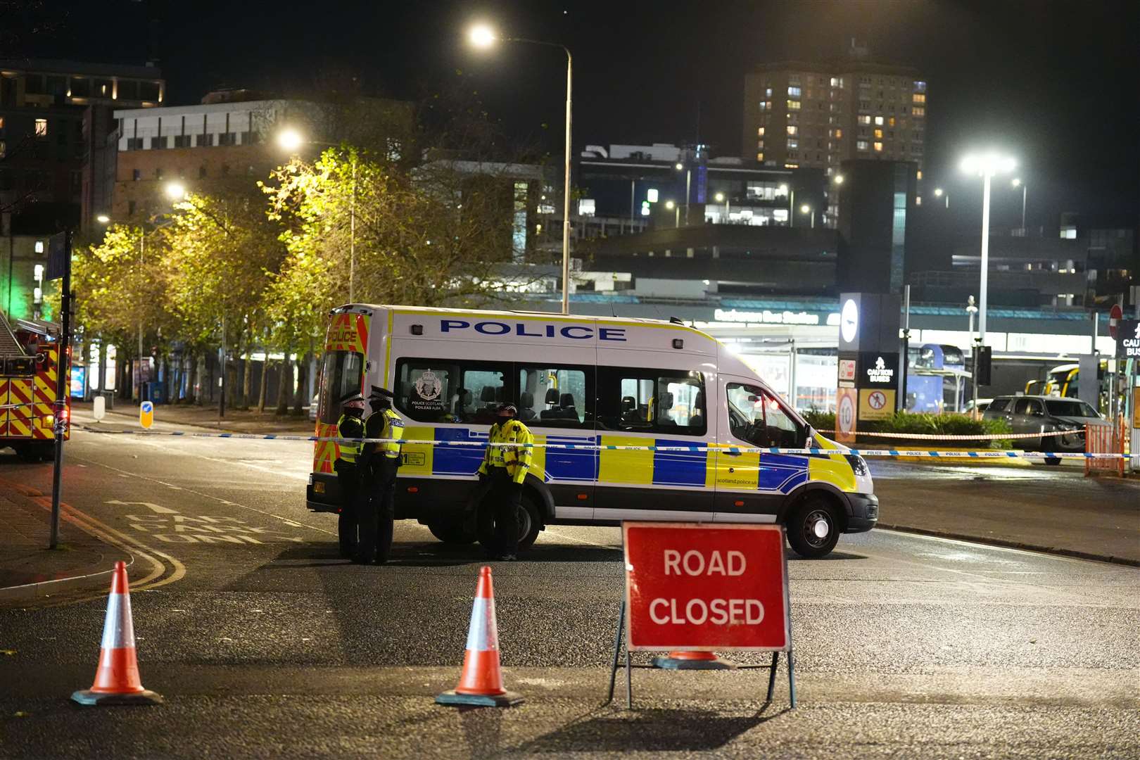 Emergency services outside the bus station in Glasgow (Andrew Milligan/PA)