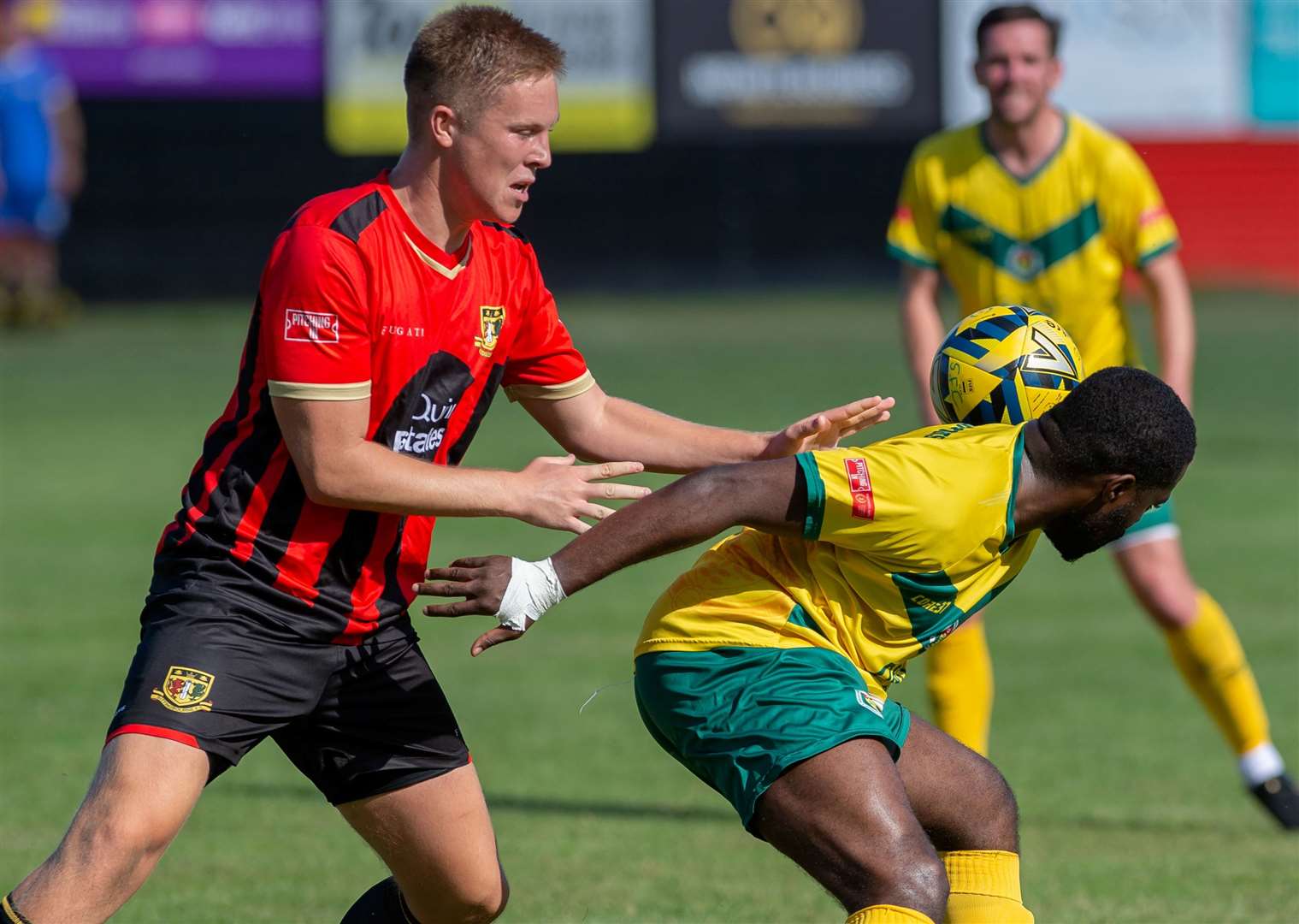 Brickies defender Joe Tyrie, left, in action against Ashford earlier this season. Picture: Ian Scammell/Isobel Scammell