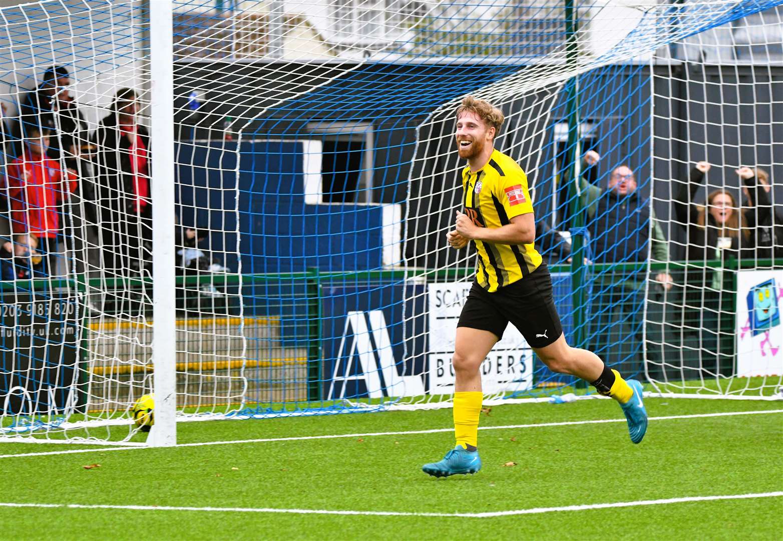 James Taylor celebrates doubling Sheppey United's lead at Herne Bay. Picture: Marc Richards