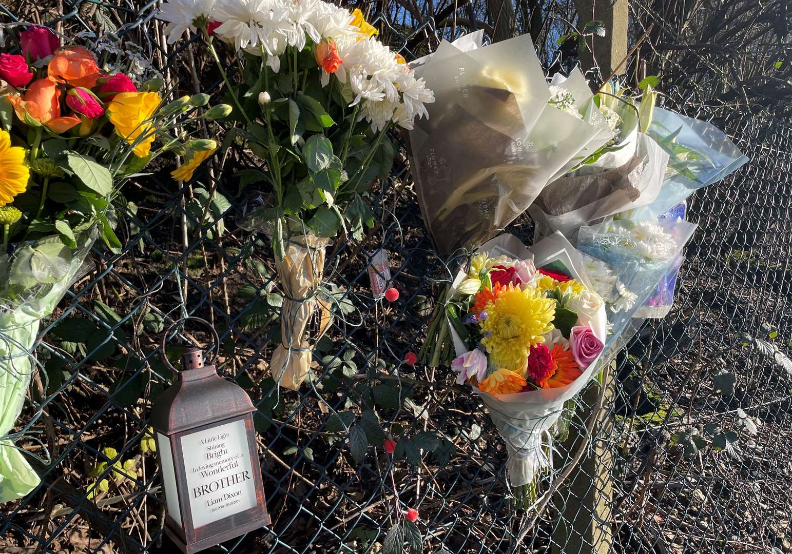 Tributes left for Liam were placed near the junction with Laker Road