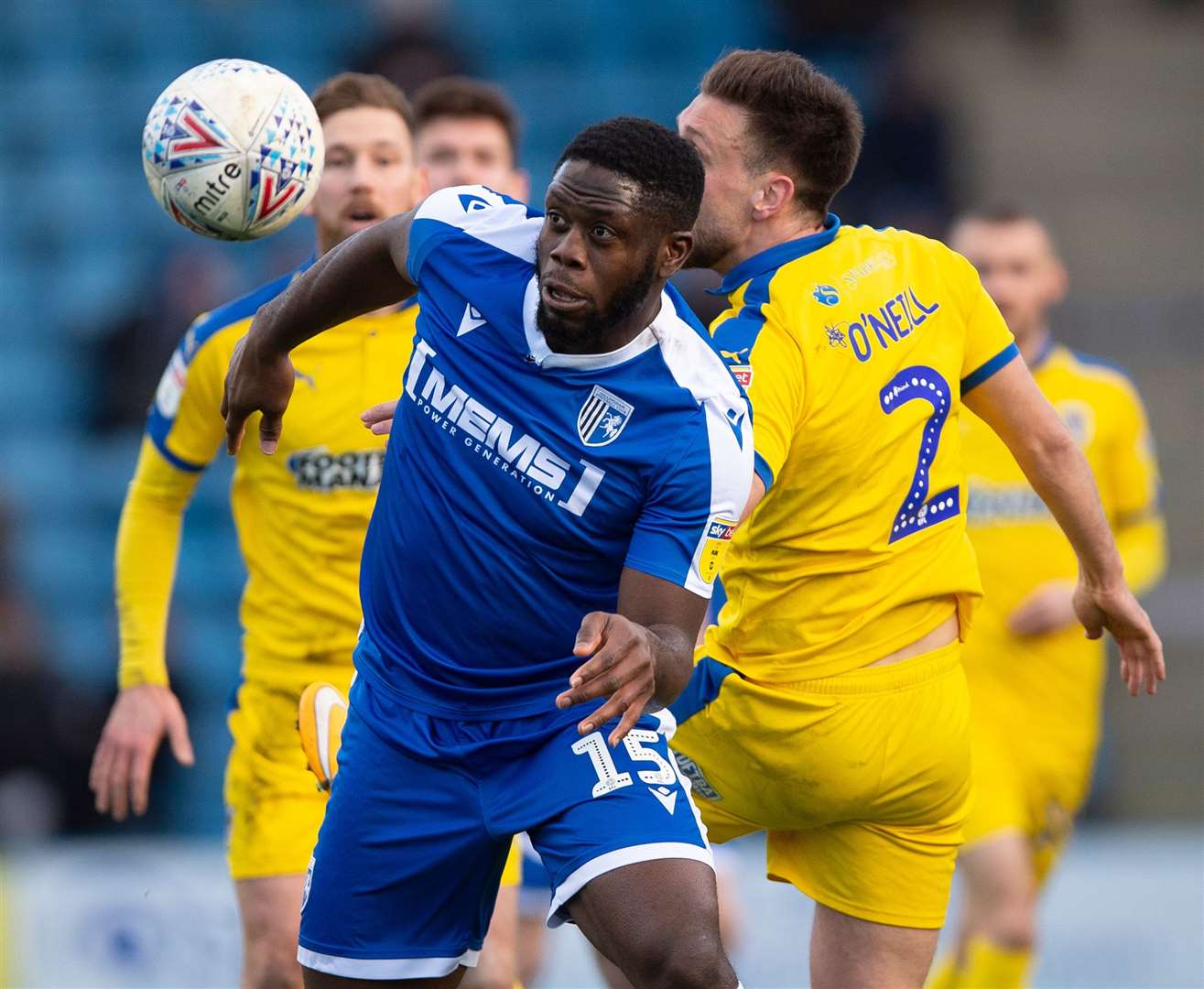 John Akinde battles former Gill Luke O'Neil Picture: Ady Kerry