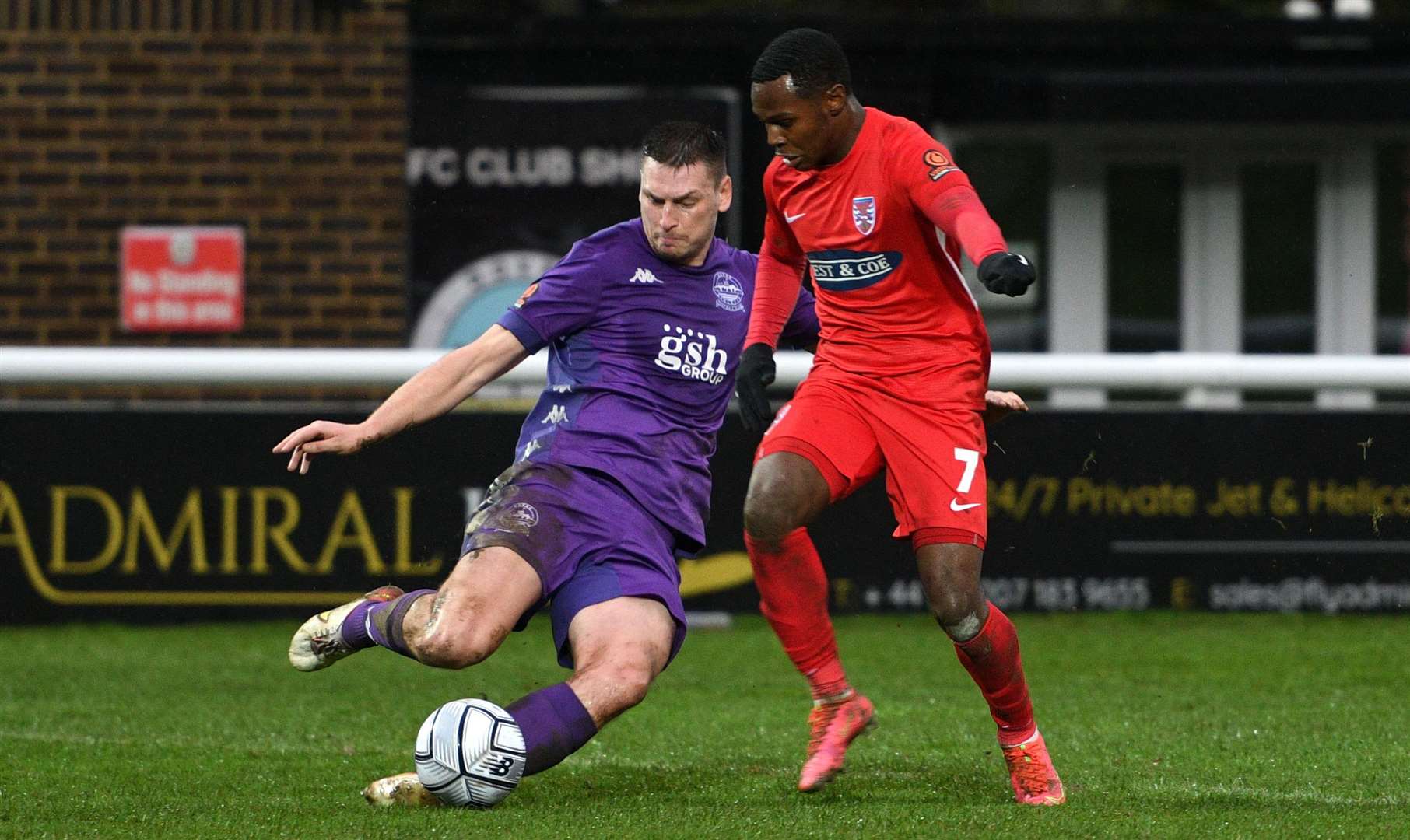 Dover defender Jake Goodman slides in against Dagenham on Boxing Day. Picture: Barry Goodwin