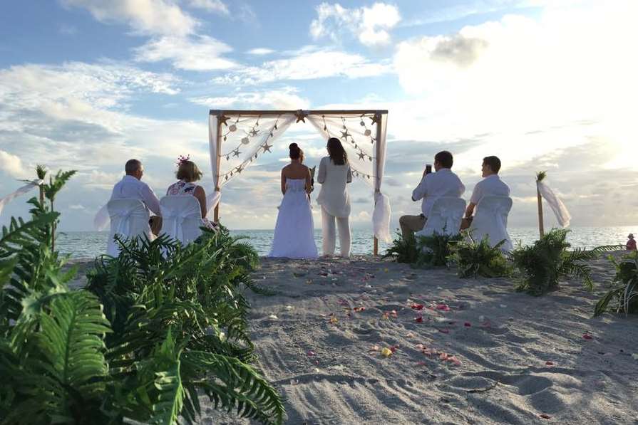 The pair at the alter. Credit: Florida Sun Weddings