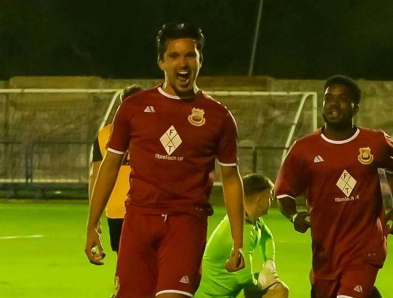 Defender Will Thomas - is trying to claim Whitstable’s only goal at Erith Town. Picture: Les Biggs