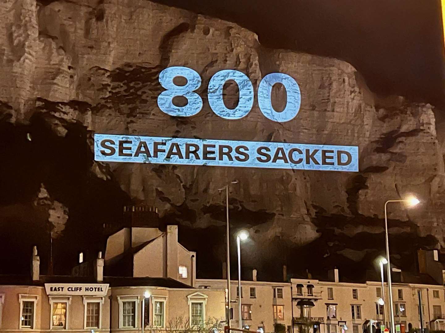 The message on the cliffs next to the Eastern Docks. Picture: Nautilus, RMT, ITF