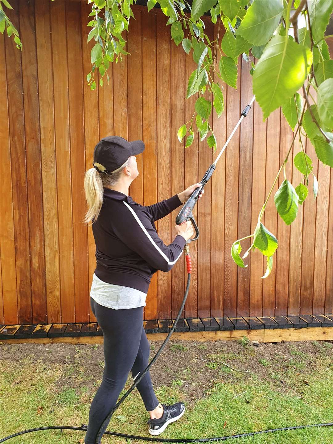 Vicky Mitford at work jet washing an area of the zoo