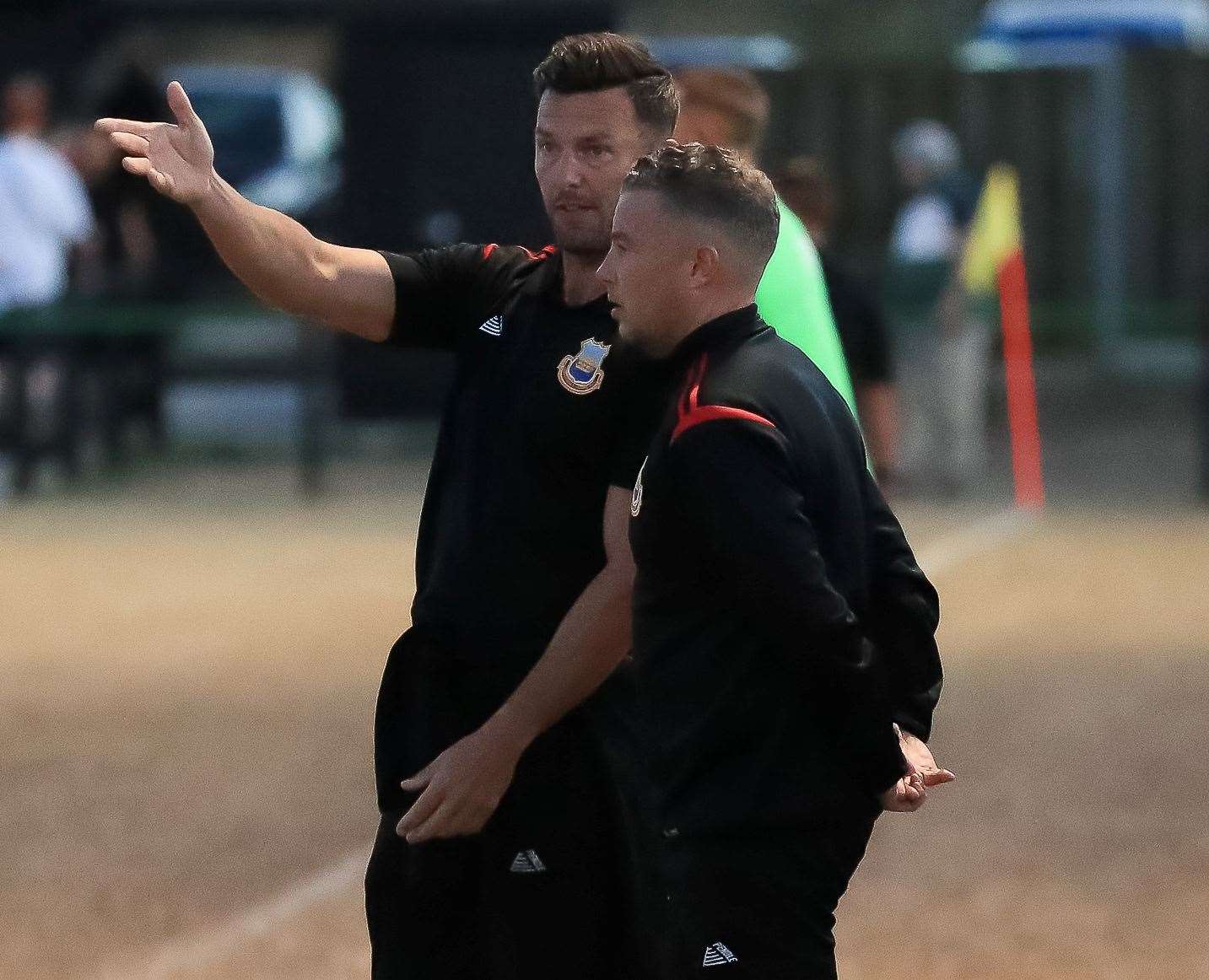 Whitstable boss Jamie Coyle and No.2 Matt Longhurst talk tactics. Picture: Les Biggs