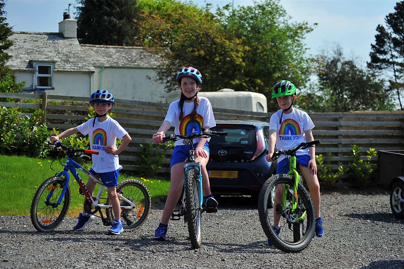 The journey took the three siblings hundreds of laps (Oliver Hodgson/PA)