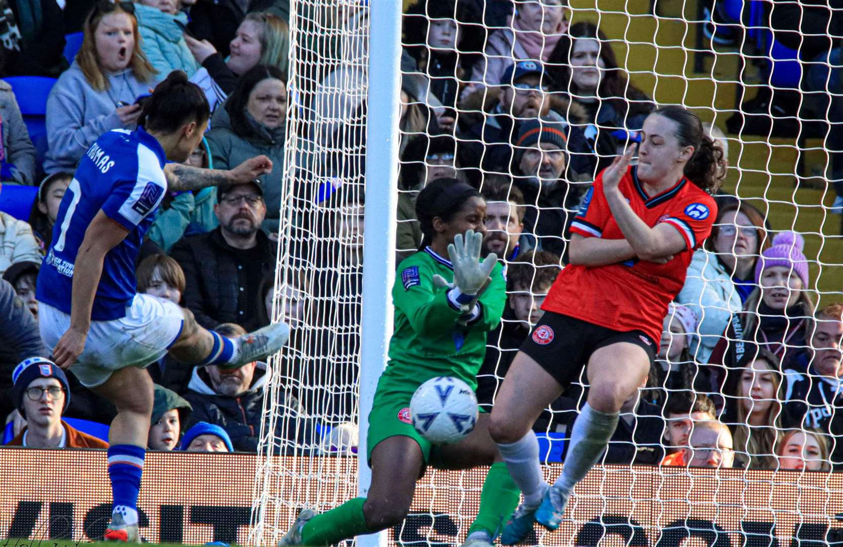 Chatham Town Women's keeper Simone Eligon and Phoebe Leitch work together to attempt to deny Ipswich. Picture: Allen Hollands