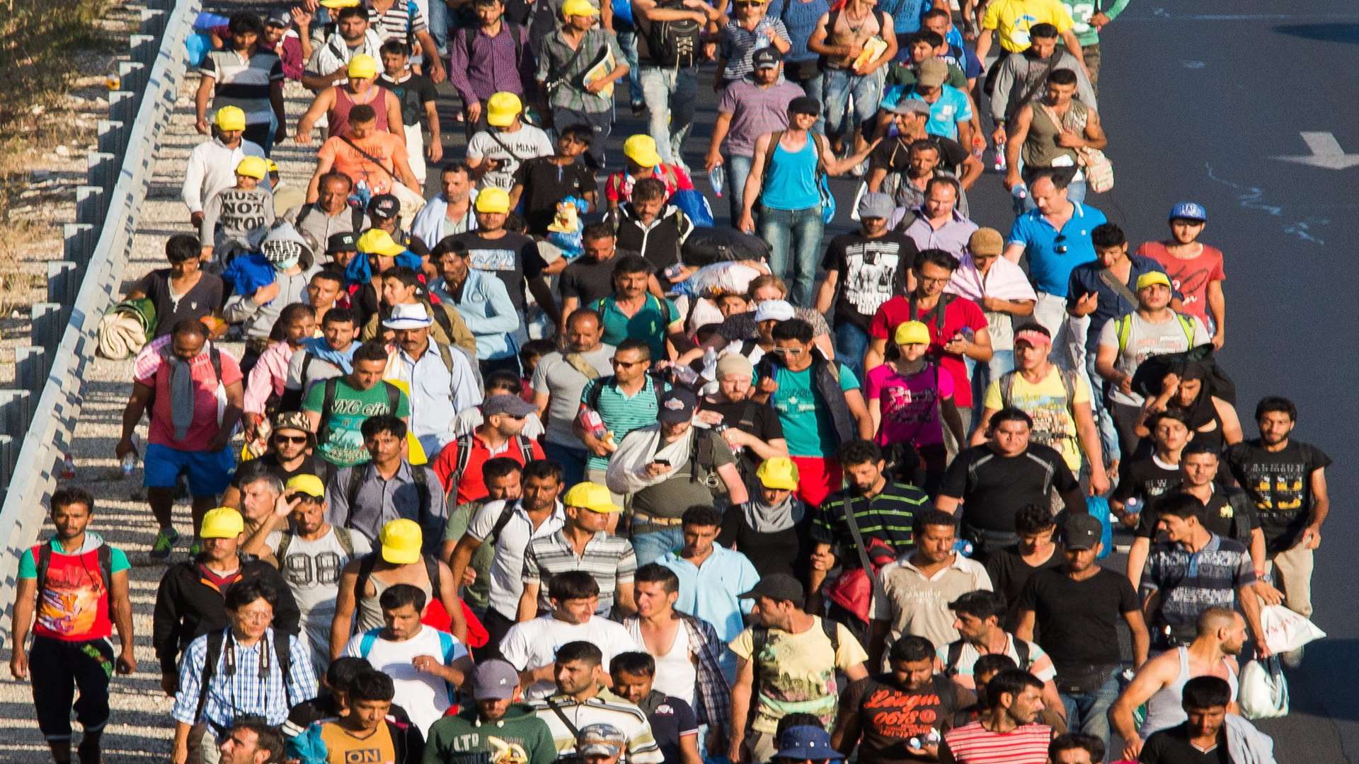 Thousands of migrants in Hungary march along the M1 in the direction of Austrian border. Many had been refused access to trains in Budapest so have started marching to the border on foot. Picture: SWNS.com