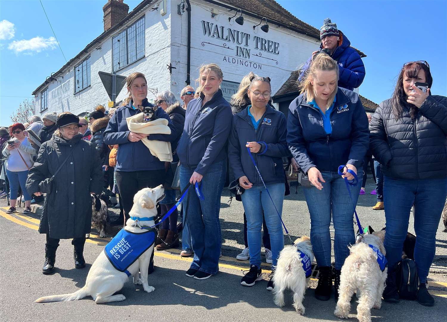 Mourners have gathered in Aldington to pay tribute to Paul O'Grady