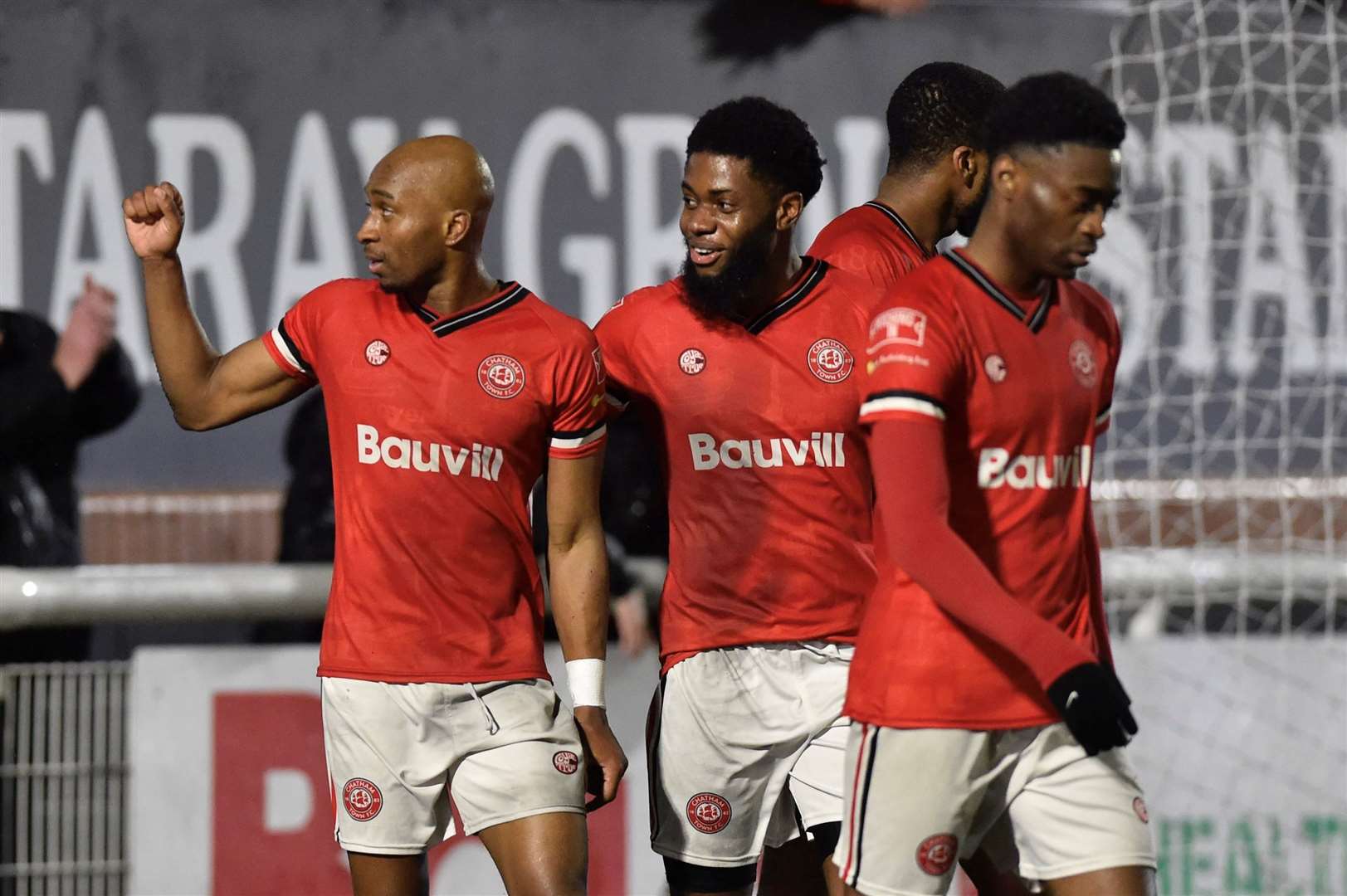 Chatham striker John Ufuah, left, celebrates against Whitehawk. Picture: Ian Scammell