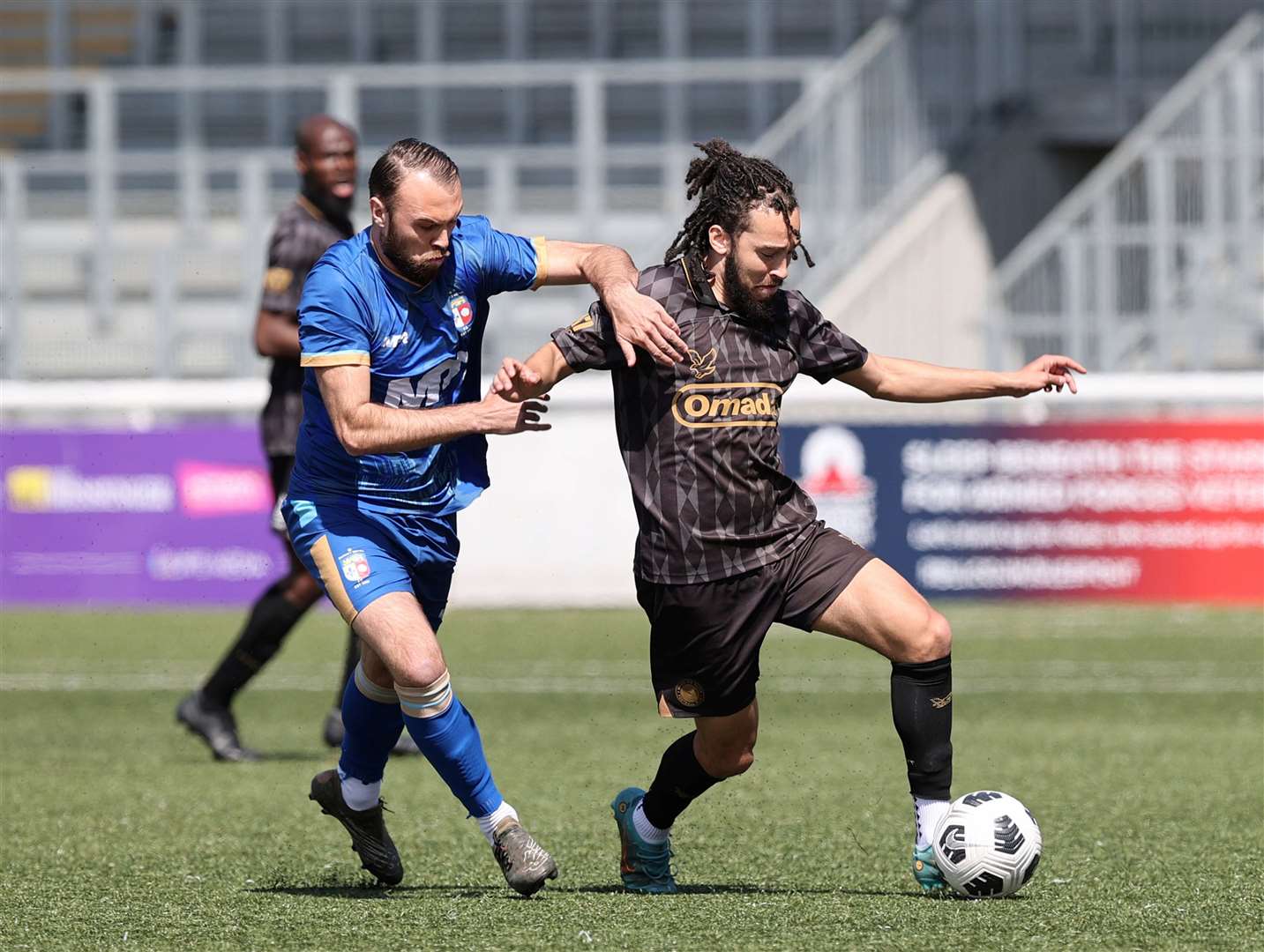 Luke Burdon, scorer of Market’s opener, closes down his man at the Gallagher. Picture: PSP Images