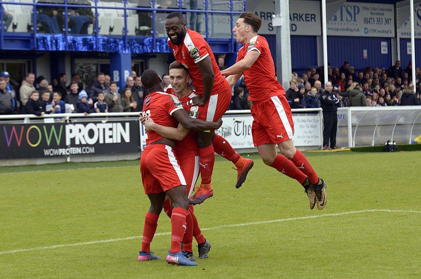 Joe Taylor (centre) scored twice in Folkestone's 2-2 draw at Billericay on Satyrday Picture: Don Linkin