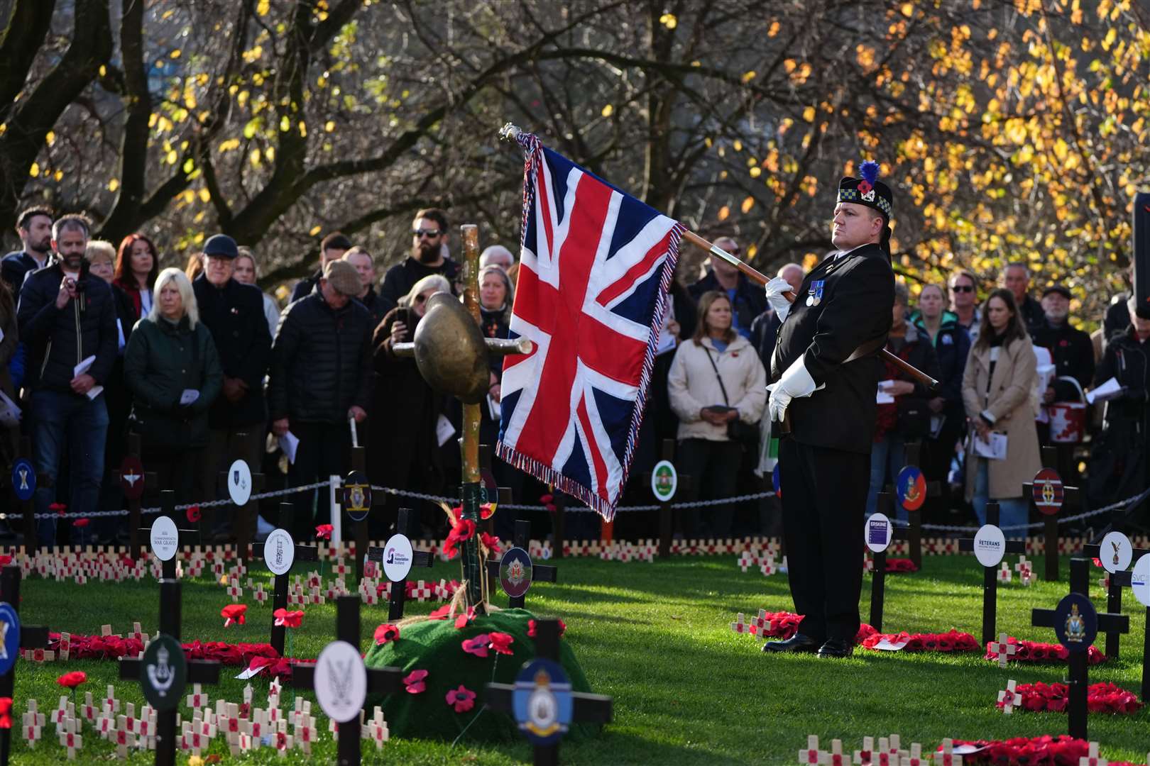 People during a ceremony to mark Armistice Day in Edinburgh (Andrew Milligan/PA)