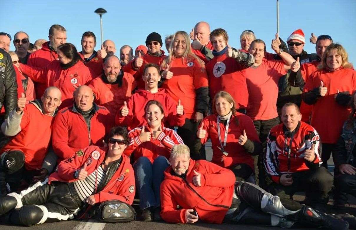 Red Road Day participants gathered wearing red Picture: Ride of Respect, Red Road Day