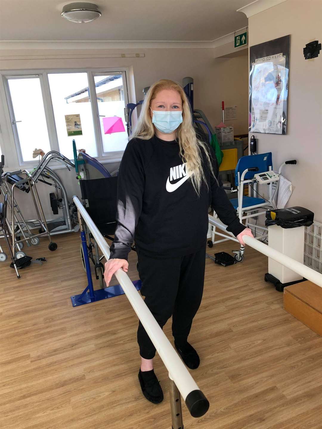 Kelly Cooney learning to walk again after suffering partial paralysis