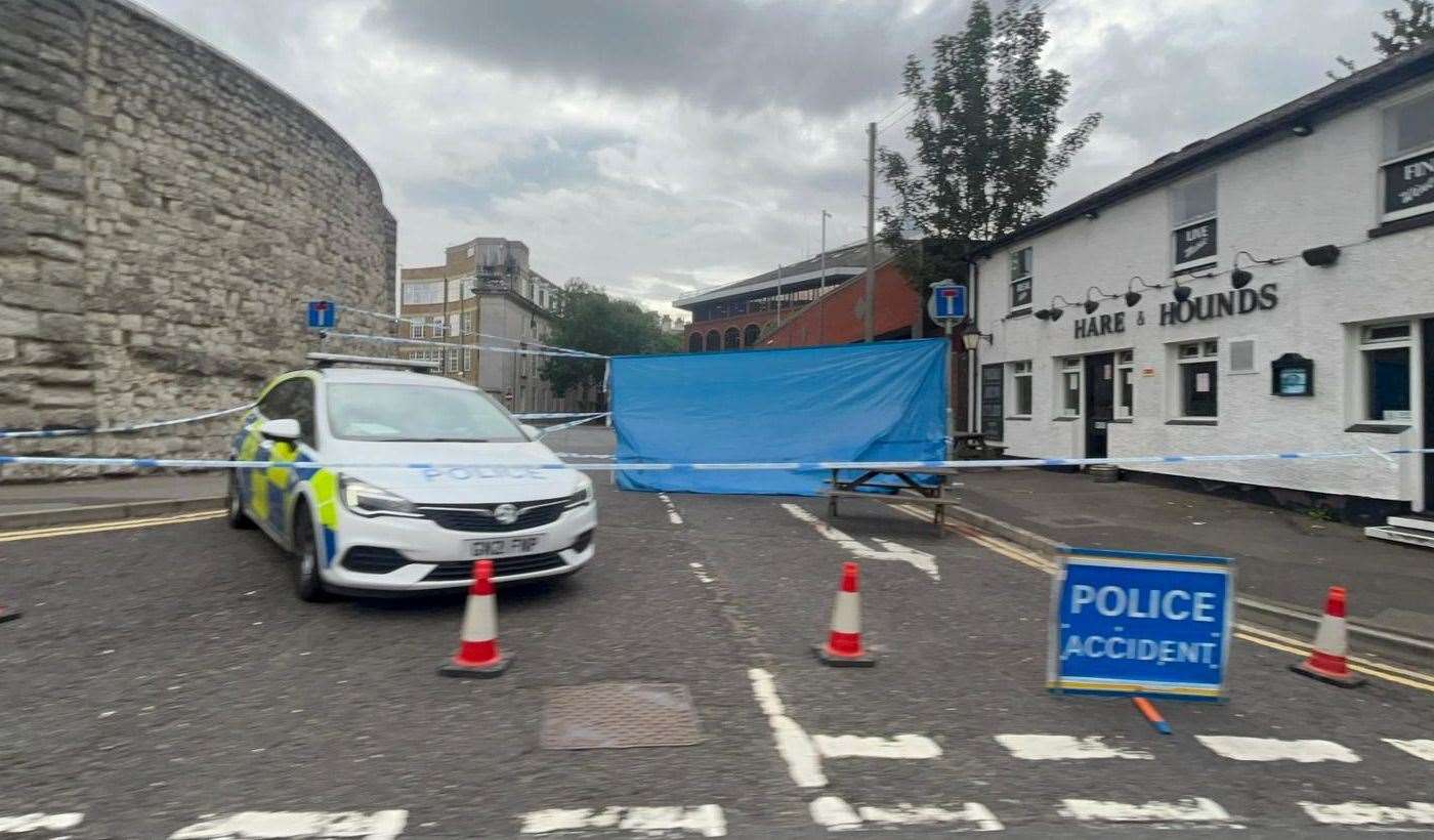 Police outside the Hare and Hounds