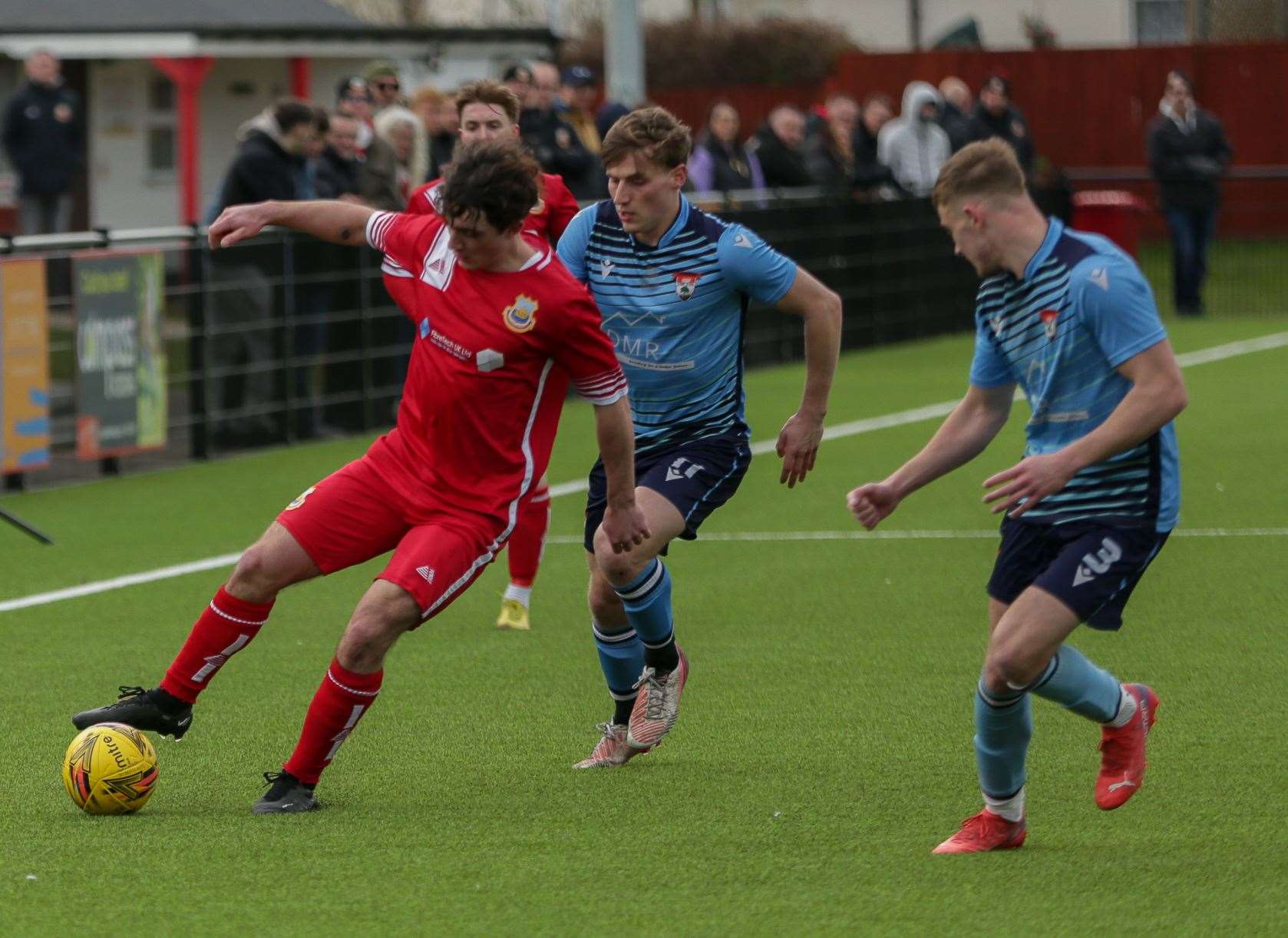 Whitstable man Gus Barnes is tracked by Will Dempsey and Ethan Stewart of Lordswood. Picture: Les Biggs