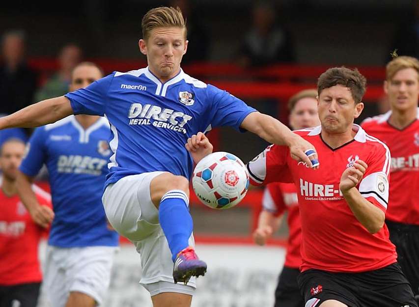 Andy Pugh (left) challenges Kidderminster's Callum Gittings Picture: Pete McKinney