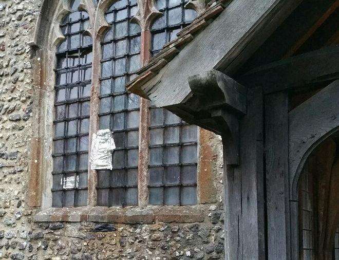 Some of the damaged windows at Lyminge Parish Church of St Mary and St Ethelburga. Credit: Kent Police (6396915)