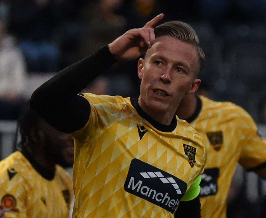 Two-goal Stones captain Sam Corne celebrates. Picture: Steve Terrell