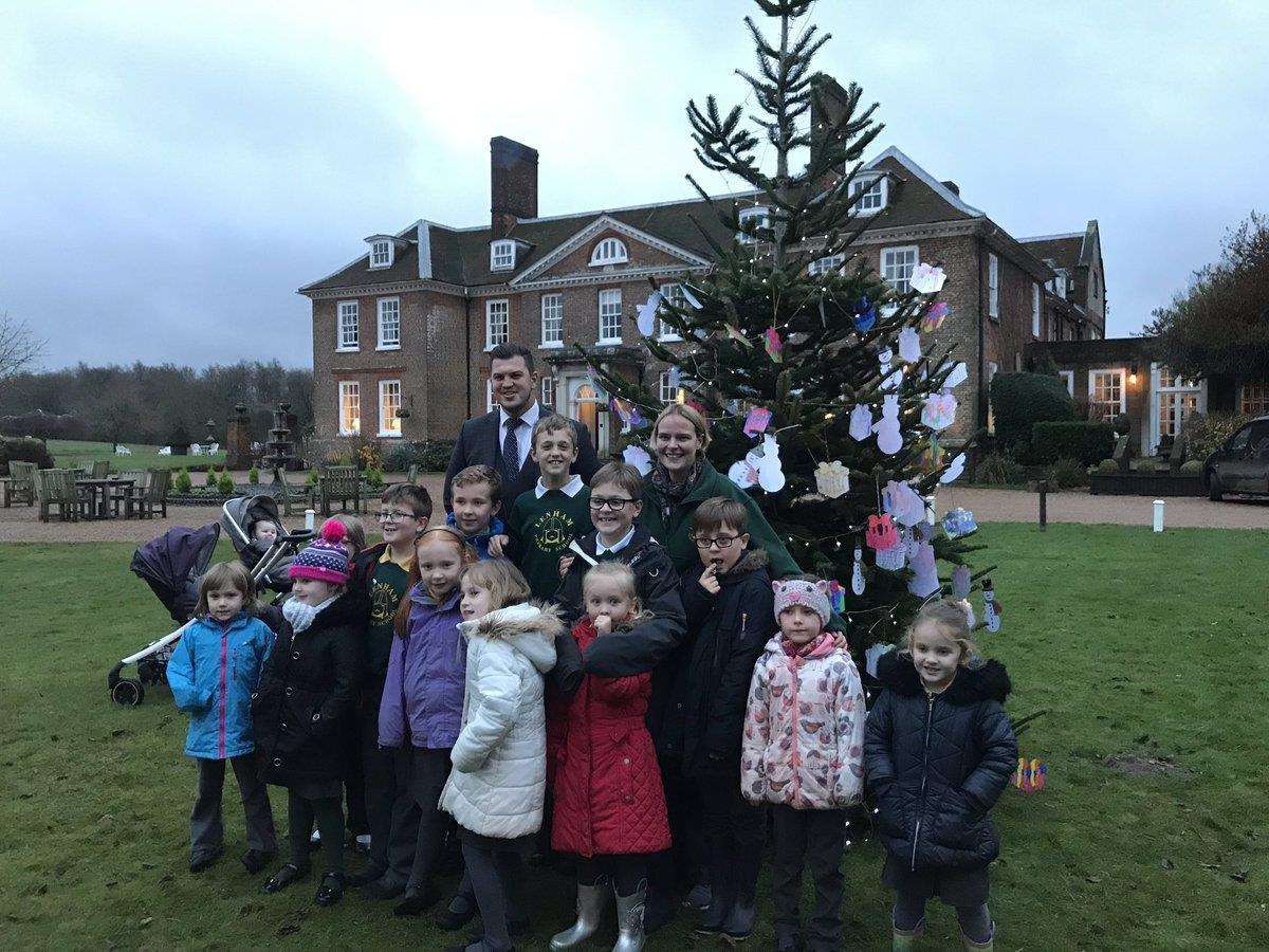 The children are pictured with Paul Pierce from Chilston Park and head teacher Andrea McCluskey