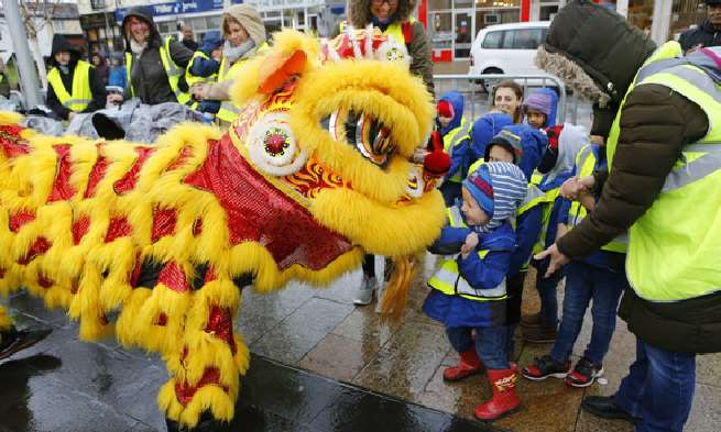 The Year of the Dog was kicked off in the Gravesend with a Chinese New Year dragon performance.