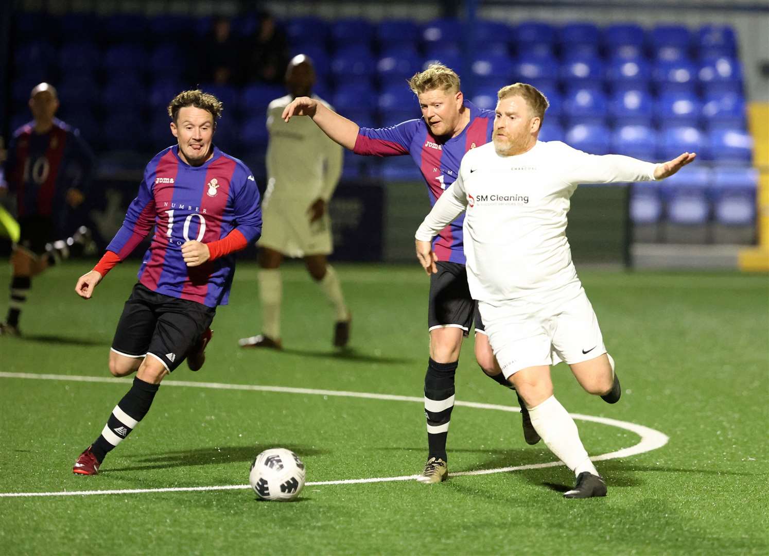 The Charcoal (white) on their way to a 2-0 victory in the DFDS Kent Veterans Cup Final. Picture: PSP Images