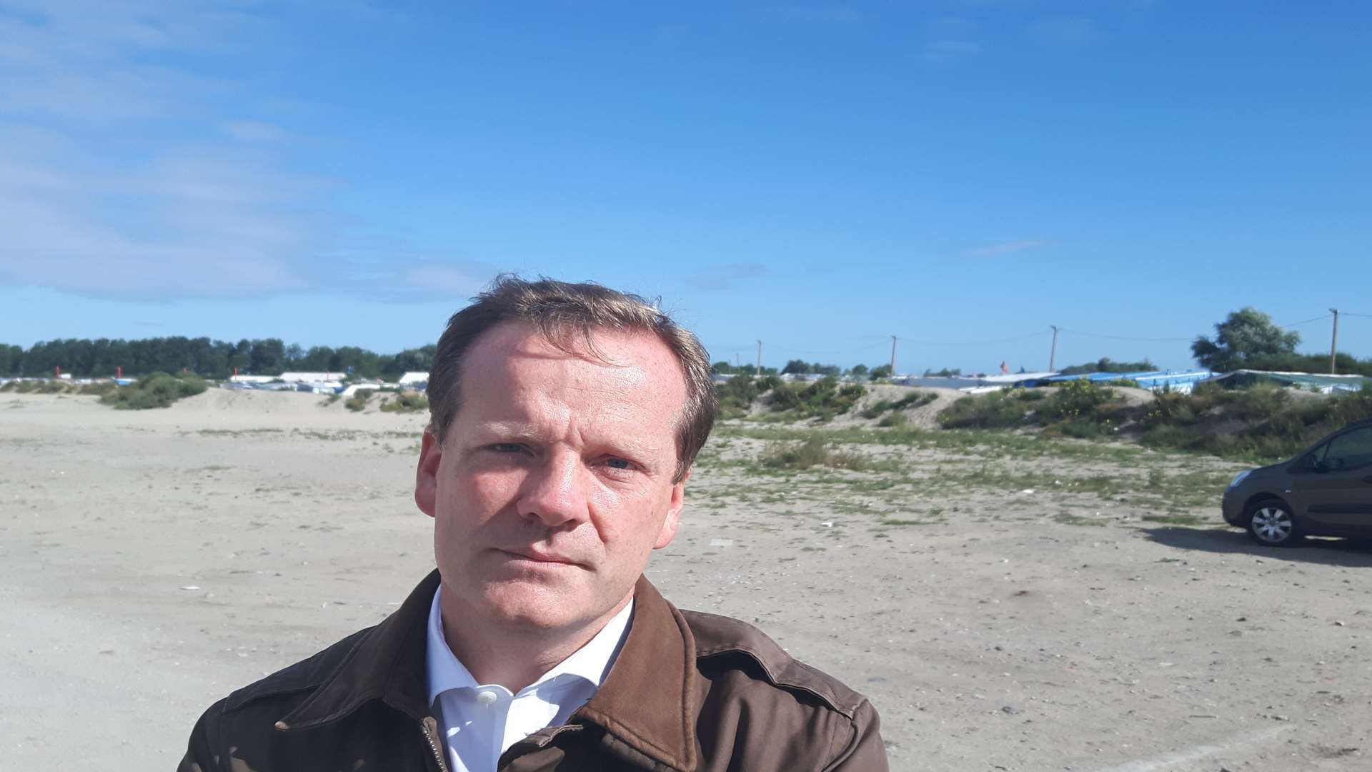 Charlie Elphicke outside the Jungle, Calais, September 2016