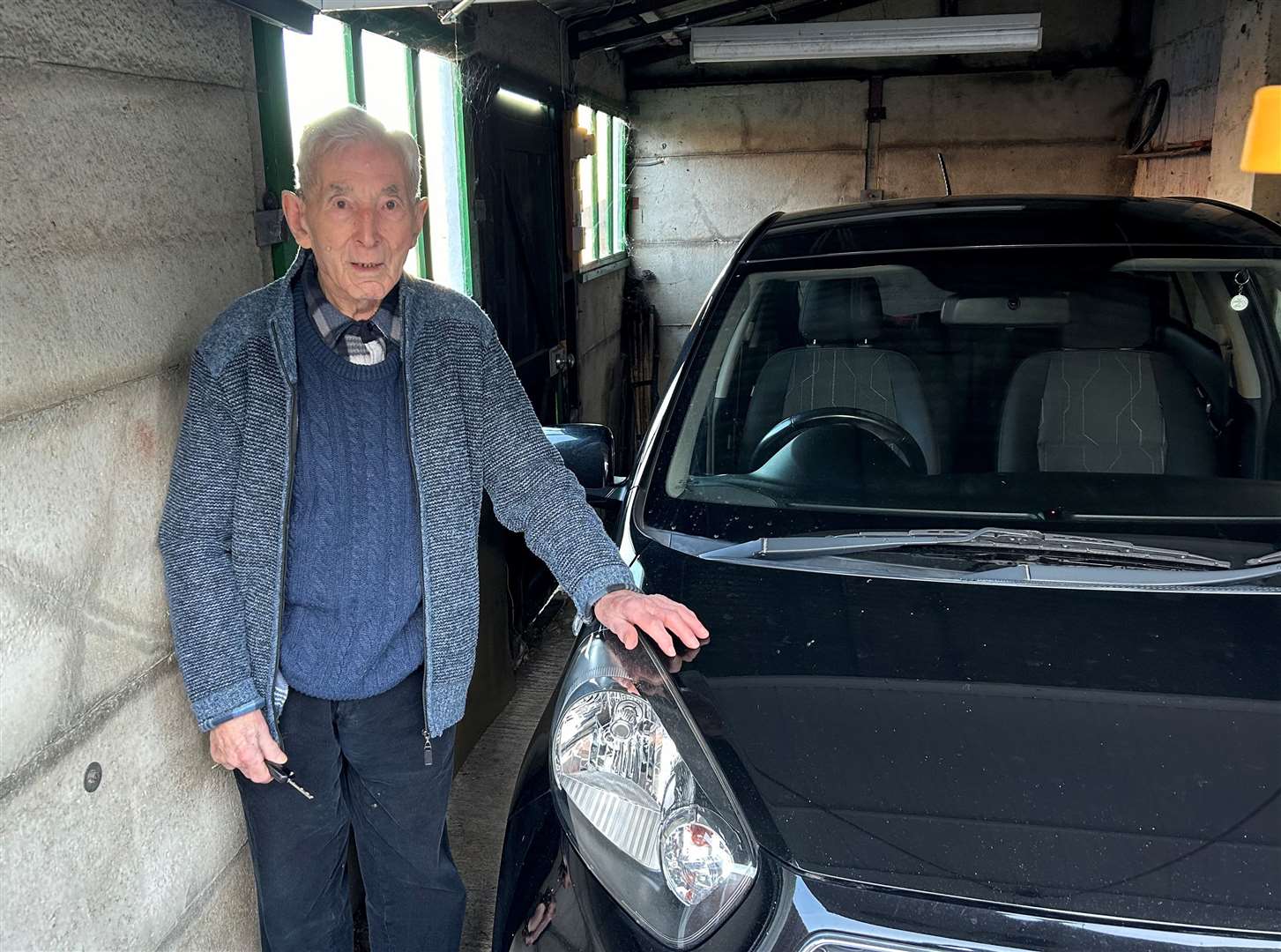 Eric Dixon with his Kia Picanto, which he bought last year