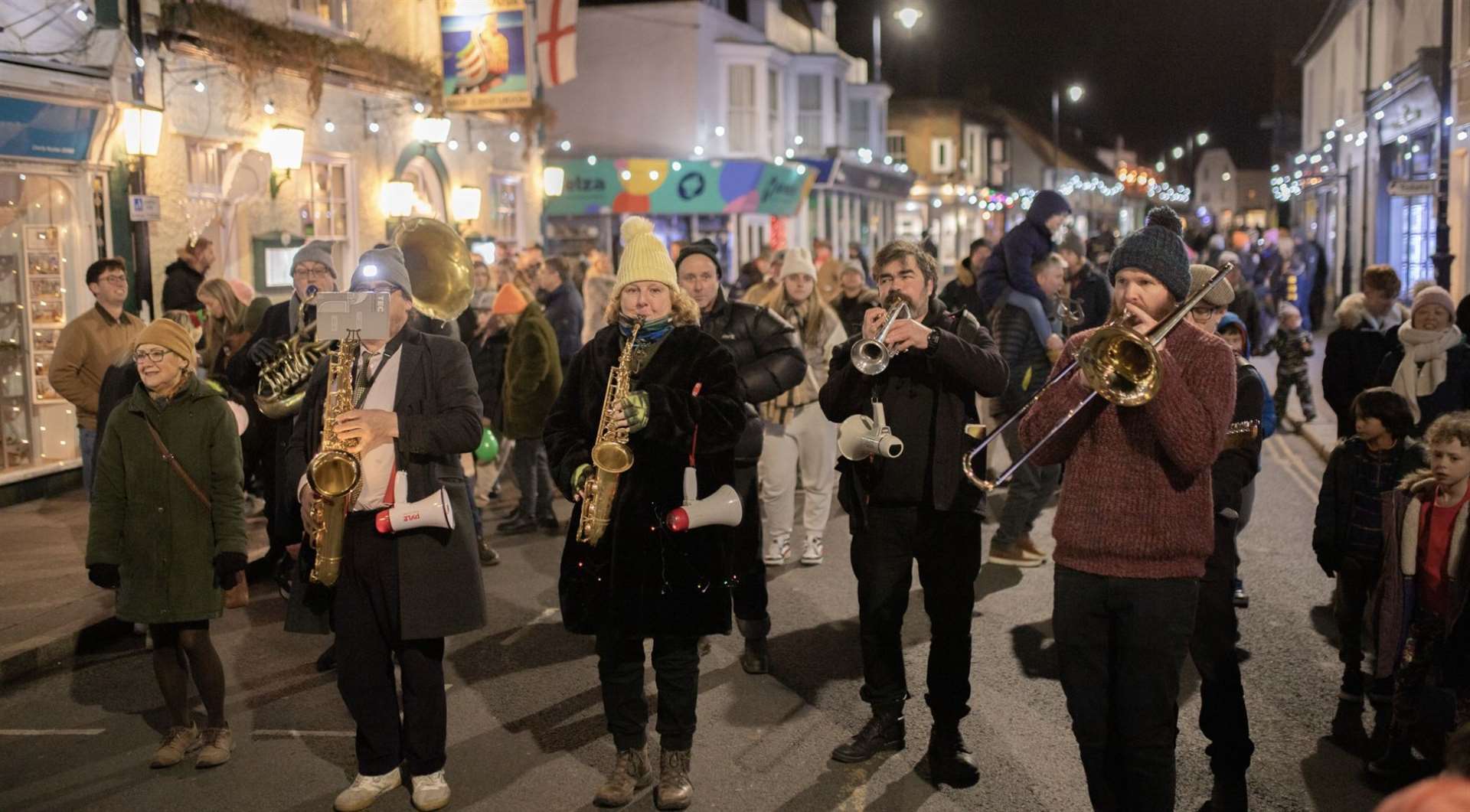 Last year, Whitstable’s Christmas light parade included music by the Oyster Band and Whitstable Sea Scouts. Picture: Andrew Hasting