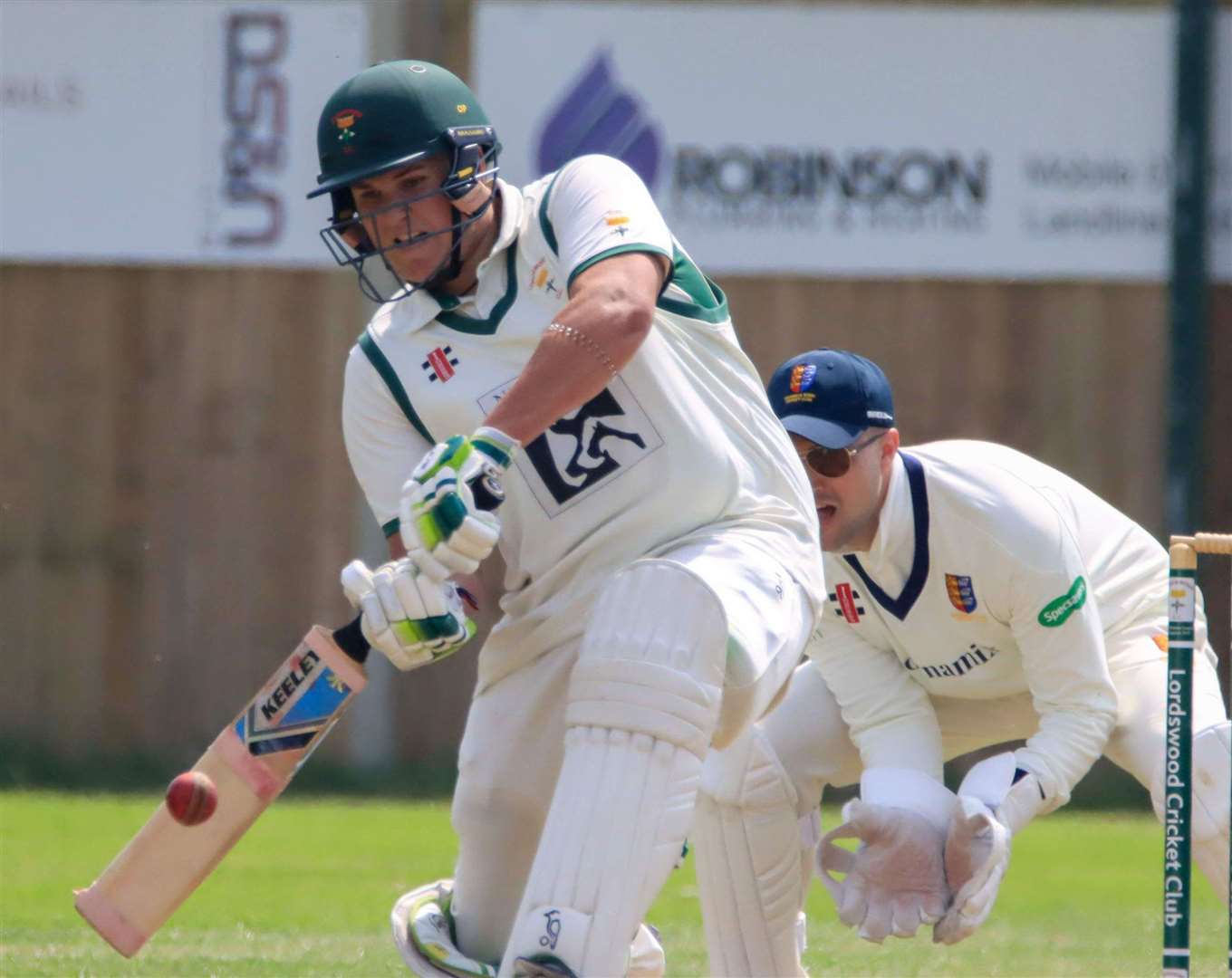 Lordswood opener Owen Palmer hit 88 off 89 balls, slog-sweeping ahead of Sandwich Town wicketkeeper Ryan Davies. Picture: Allen Hollands